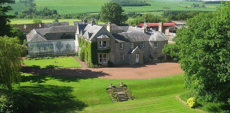Newton Farmhouse set against the rolling Scottish Borders countryside