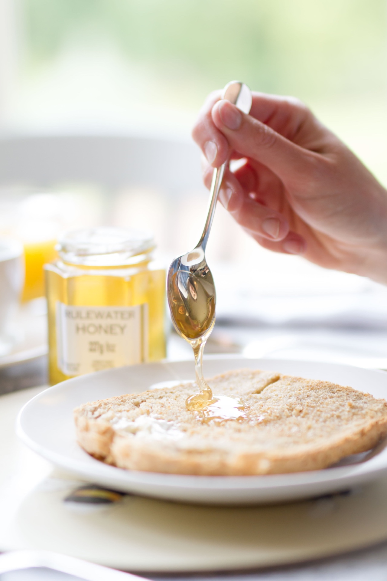 Local Rulewater honey drizzled on toast